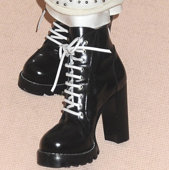 Selena Gomez Falls Flat In Inelegant Louis Vuitton Boots