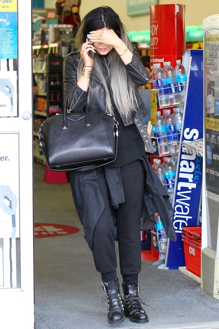Kylie Jenner hiding her face while shopping at CVS Pharmacy