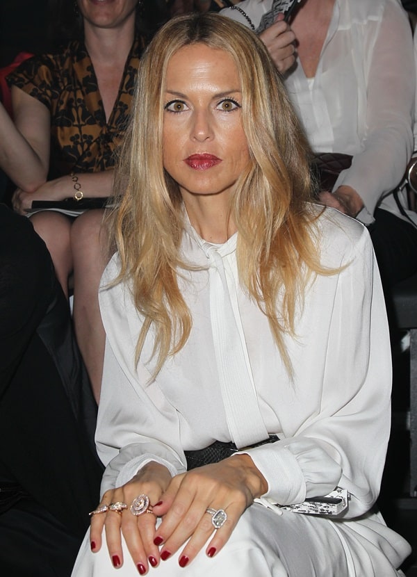 Rachel Zoe makes a fashion statement at Paris Fashion Week Spring/Summer 2012 with a simple yet captivating top and maxi skirt combo, brilliantly accessorized with black