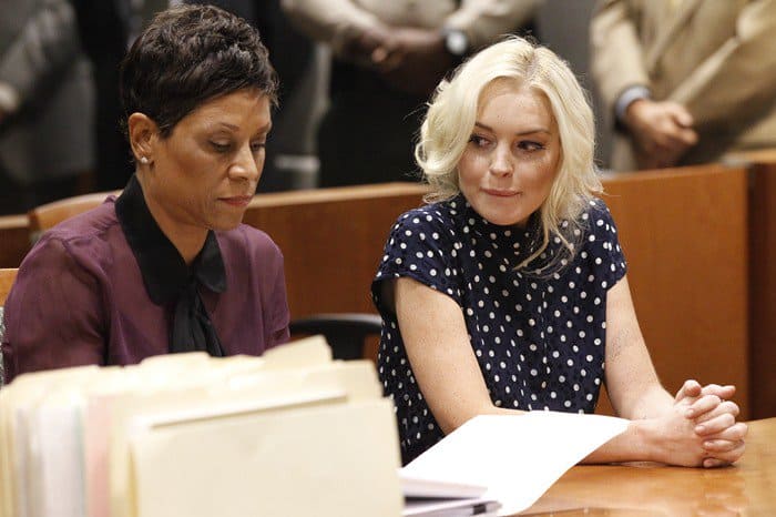 Lawyer Shawn Chapman Holley and Lindsay Lohan inside the Los Angeles County Superior Court Airport Courthouse during Lohan's hearing