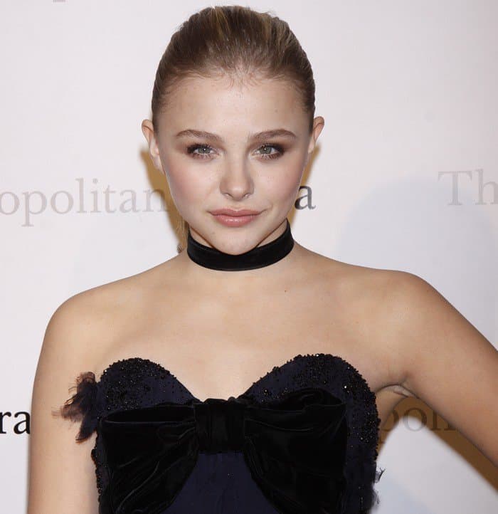 Chloe Moretz in a blue YSL tiered gown at the Metropolitan Opera's premiere of Jules Massenet's 'Manon'
