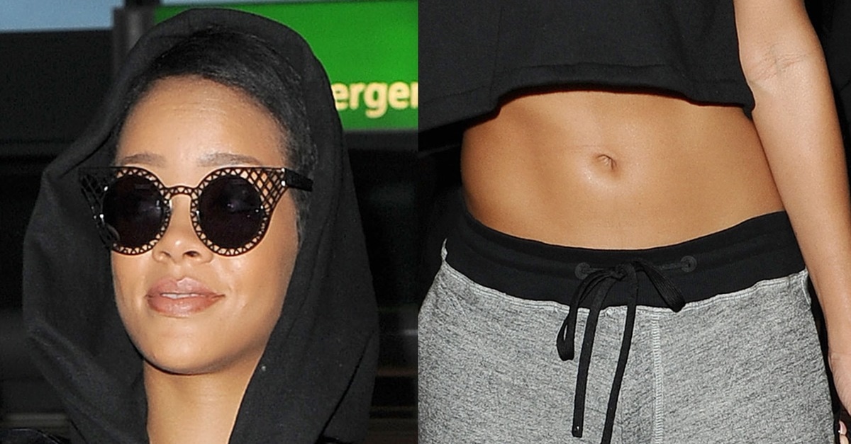 Rihanna's Sexy Belly Button In Crop Top And AthleticInspired Pants
