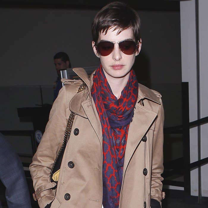 Bride-to-Be Anne Hathaway Stuns in Scarf & Ray-Bans at Airport