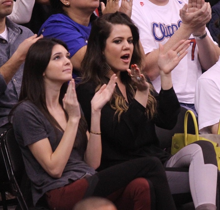 Khloe Kardashian and Kendall Jenner watching the LA Clippers vs. Milwaukee Bucks game at the Staples Center in Los Angeles on March 6, 2013