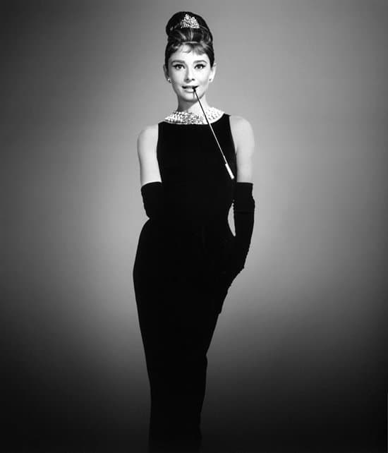 Audrey Hepburn as Holly Golightly in the iconic black dress by Givenchy