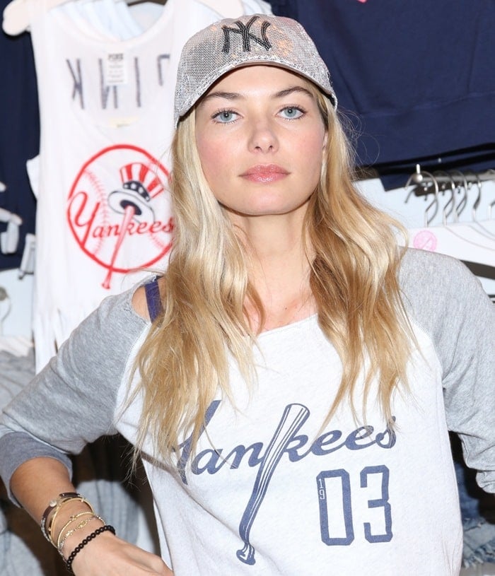 Jessica Hart shows her support for the New York Yankees in a sporty-chic look, pairing a Yankees cap with a casual baseball tee at a PINK MLB Collection launch event