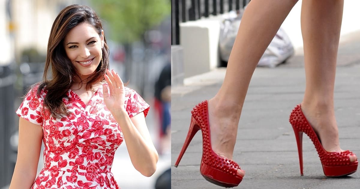 Kelly Brook wearing red 'Lady Peep Spikes' heels