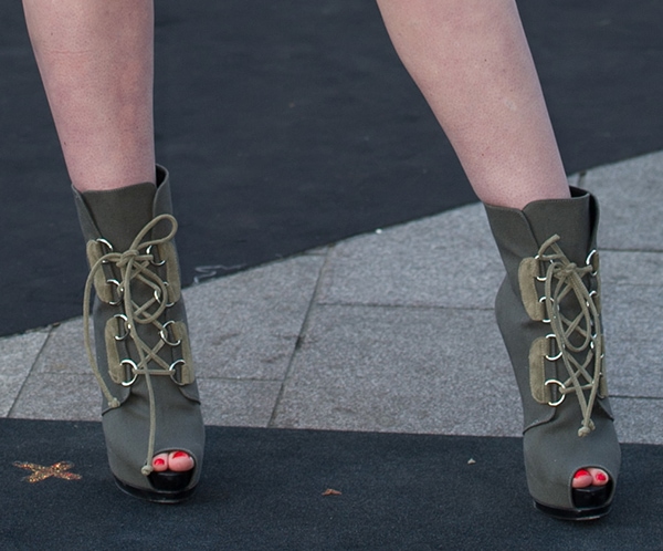 Iggy Azalea showing off her legs in Giuseppe Zanotti boots