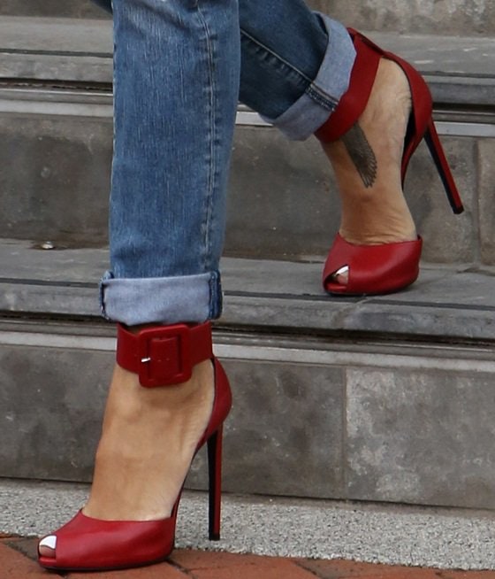 Rihanna showing off her feet in Saint Laurent Paris ankle-cuff sandals