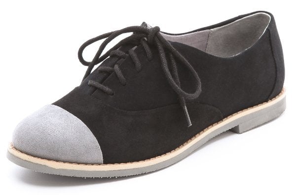 Suede oxfords cut a sleek profile with a tonal lace-up closure and contrasting toe cap