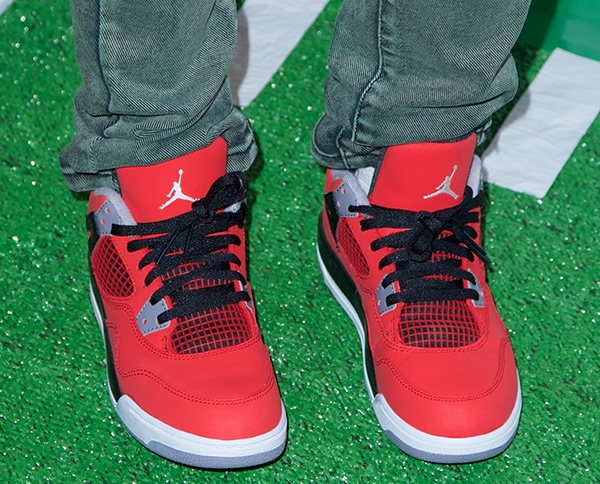 Adrienne Bailon's cool red Jordan sneakers