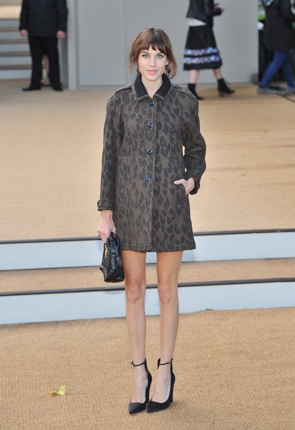 Alexa Chung exudes vintage charm in a printed coat and ankle-strapped pumps