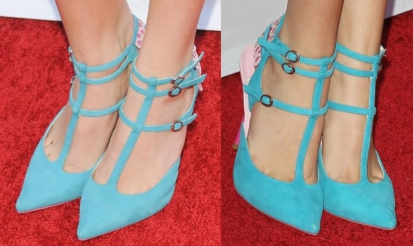 Bella Thorne shows off her feet in vibrant blue and pink shoes