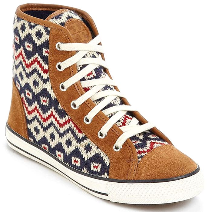 Step into ultimate style with the captivating Tory Burch Noah high-top sneakers showcasing a stunning combination of colors, including rich brown, deep navy, and vibrant multicolor hues