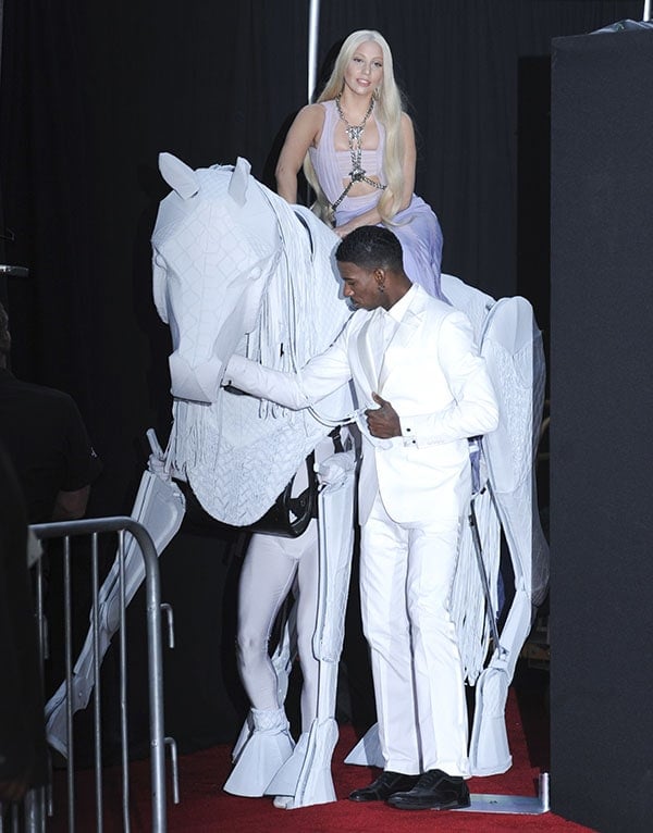 Lady Gaga arrived on a human-powered Trojan horse reminiscent of Bianca Jagger