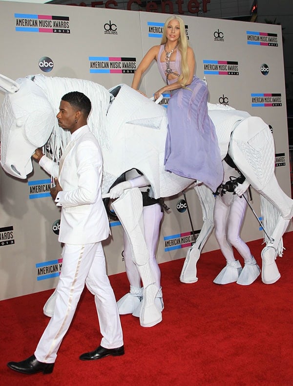 Lady Gaga arriving on a "horse" at the 2013 American Music Awards at the Nokia Theater L.A. Live in Los Angeles on November 24, 2013