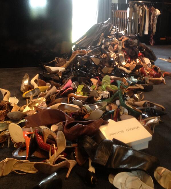Victoria Beckham's pile of shoes to donate takes over a portion of a room