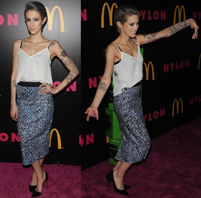 Dev in a ladylike outfit at the Nylon December issue celebration at Smashbox in West Hollywood