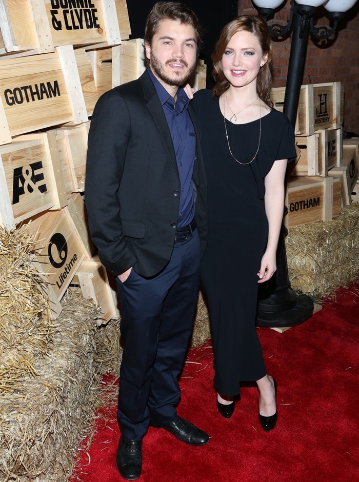Emile Hirsch and Holliday Grainger pose for photos on the red carpet of the Bonnie & Clyde premiere party