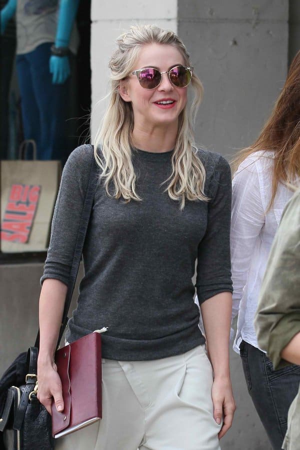 Julianne Hough rocks partially rimmed cat-eye sunglasses from Quay Australia with a cool, vintage vibe featuring adjustable nose pads for no-slip wear