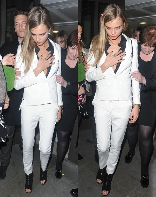 Cara Delevingne in a buttoned-down inner blouse that added major oomph to her ensemble