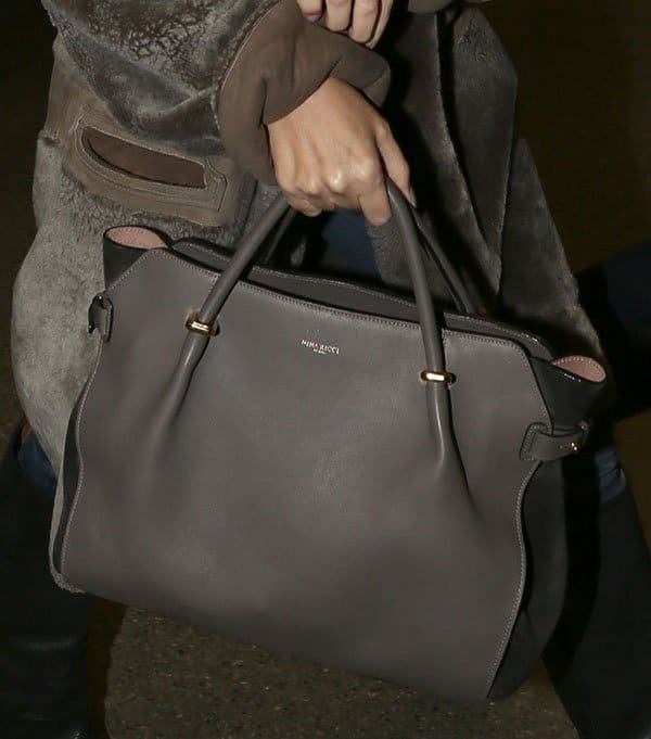 Kylie Minogue Travels With Nina Ricci's Marche Tote Bag