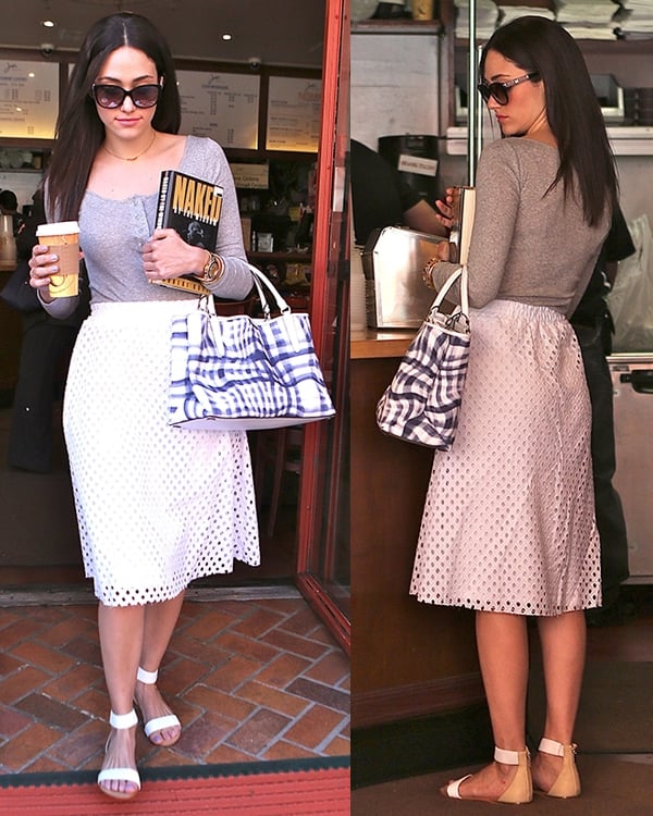 Emmy Rossum picks up coffee in Beverly Hills while carrying "Naked by the Window: The Fatal Marriage of Carl Andre and Ana Mendieta," dressed in a grey blouse, white eyelet skirt, and Yosi Samra sandals