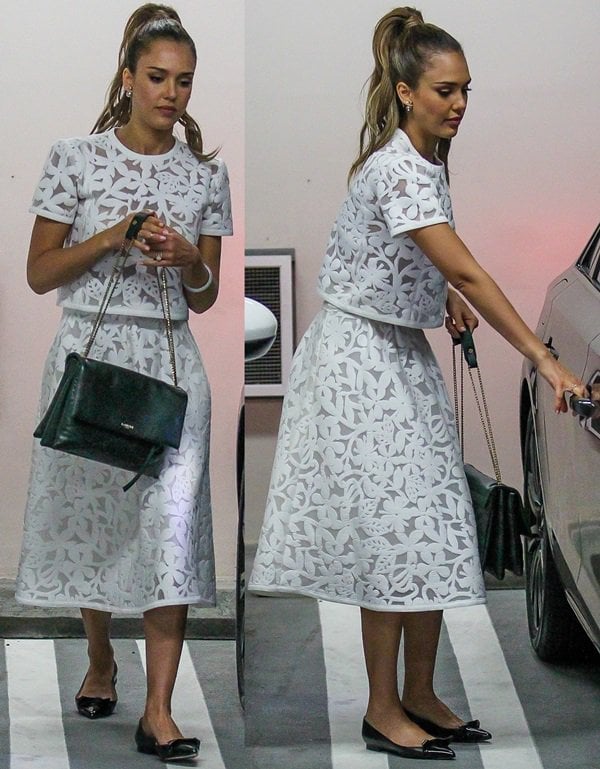 Jessica Alba wearing a floral mesh crop Bora top and a Madison skirt from Toronto-born designer Tanya Taylor