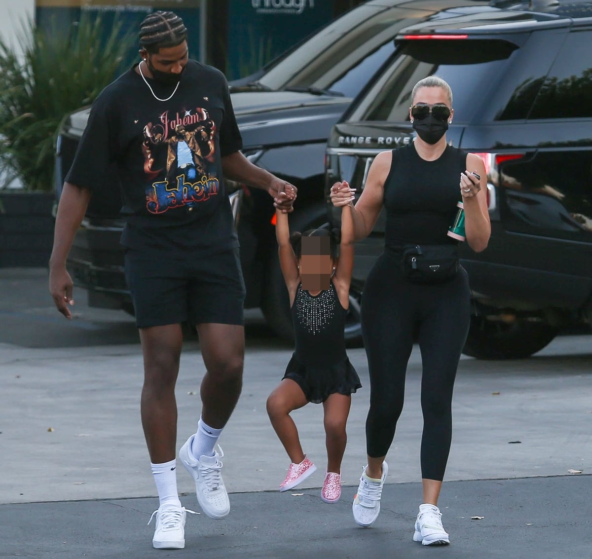 Khloe Kardashian and on-off boyfriend Tristan Thompson hold hands with their daughter True