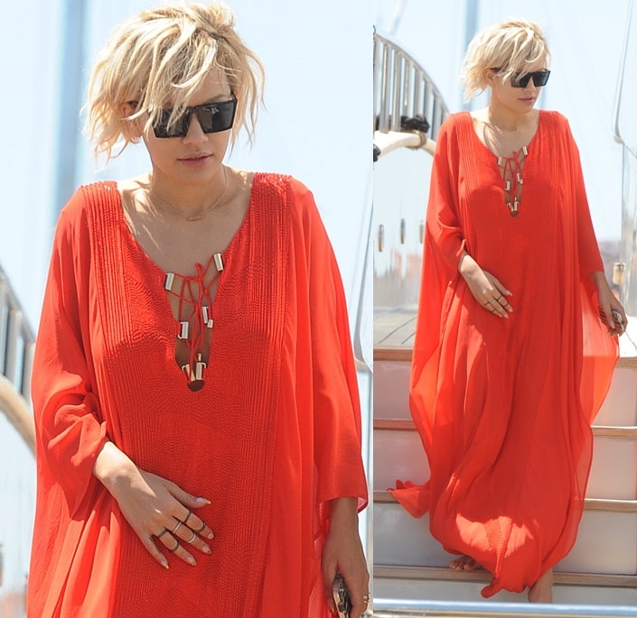 Rita Ora sports a red flowy kaftan over her bikini as she enjoys the sunny weather in Cannes, France, May 17, 2014