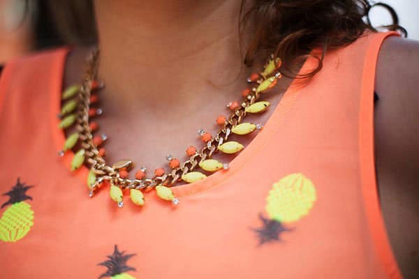 Virginie's necklace featuring yellow and orange stones