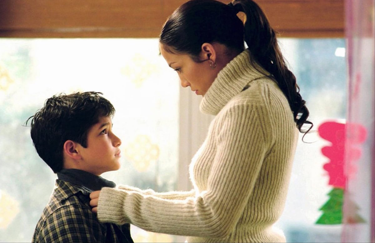 Jennifer Lopez as Marisa Ventura and Tyler Posey as Ty Ventura in a heartfelt scene from Maid in Manhattan