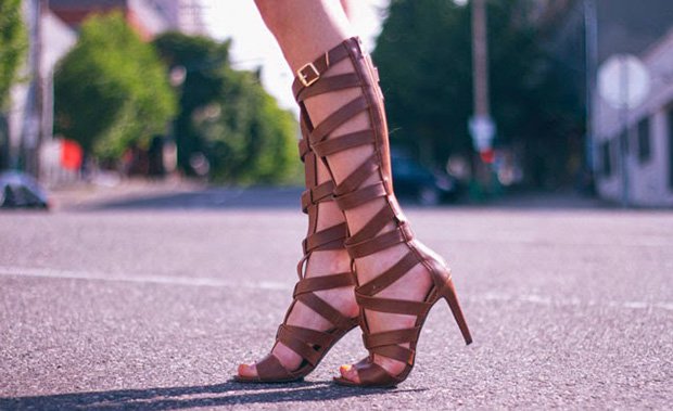 Kacie Cone in knee-high gladiator sandals