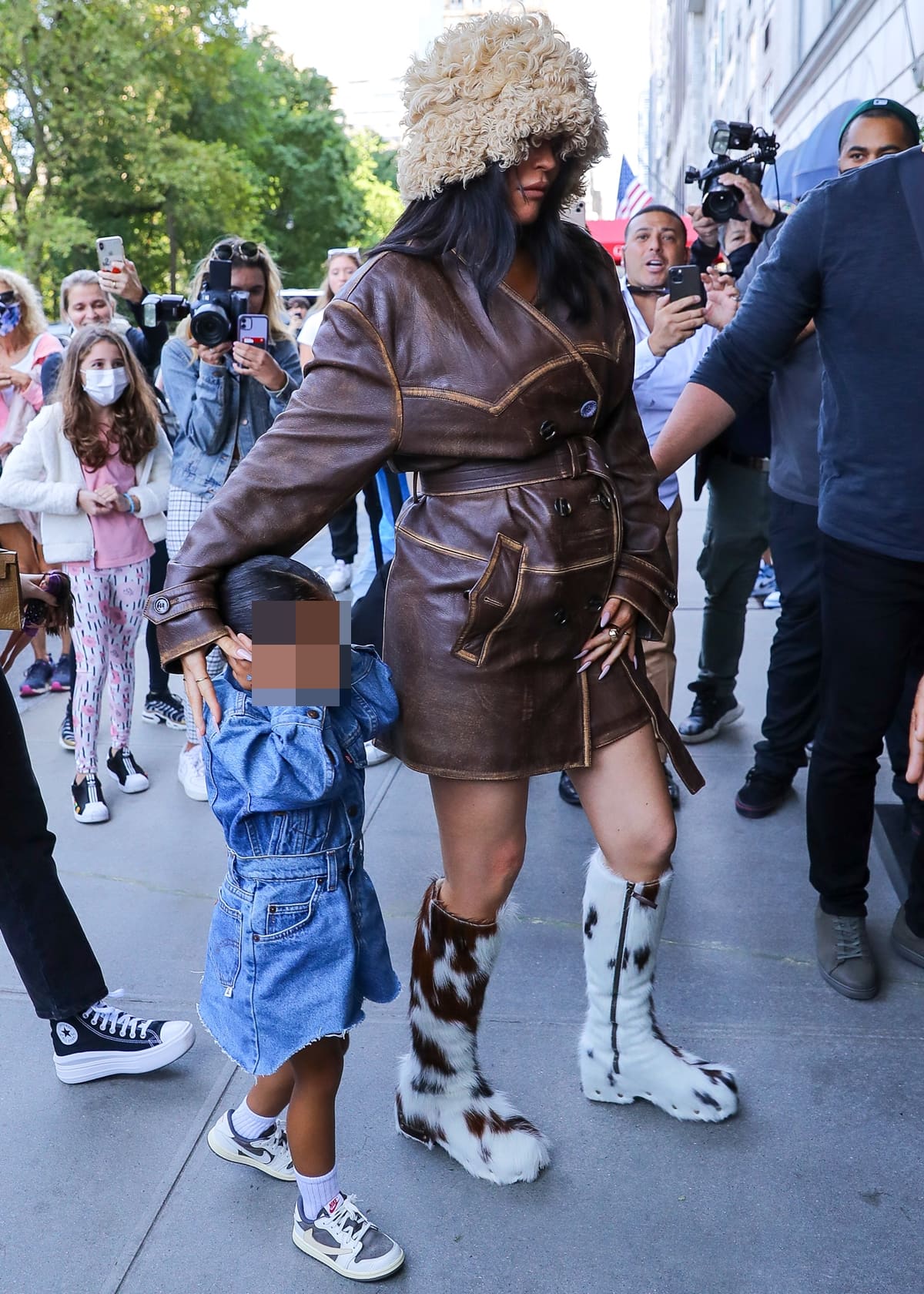 Pregnant Kylie Jenner and her daughter Stormi Webster arriving back at their hotel in NYC