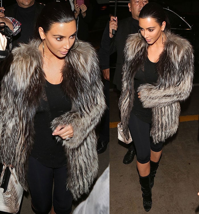 Kim Kardashian West at LAX Airport on January 10, 2015, wearing a Rick Owens cotton-jersey tank, Balmain silk button boots, and carrying a rare Hermes Himalayan Birkin bag