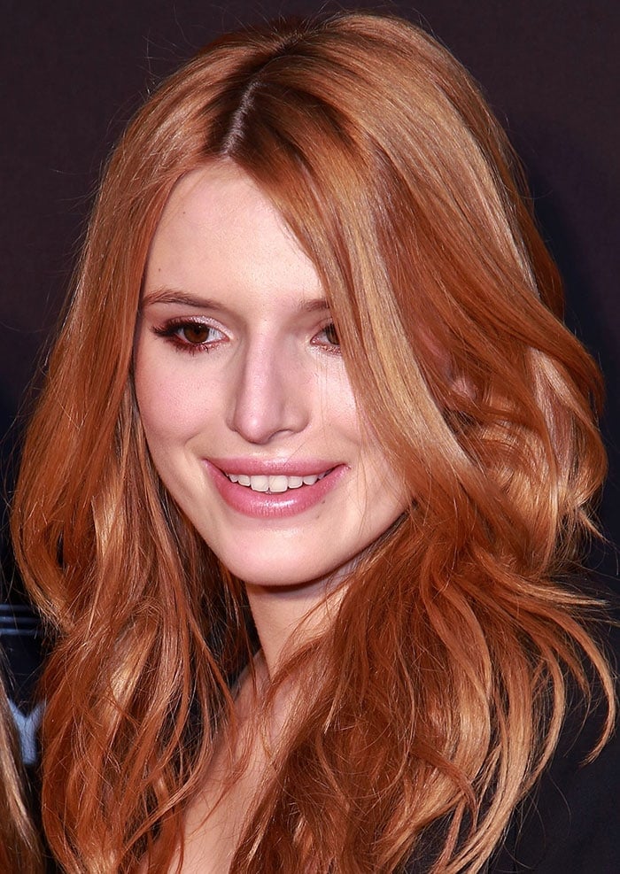 Underage Bella Thorne's Cleavage in Risque Studded Bra Top