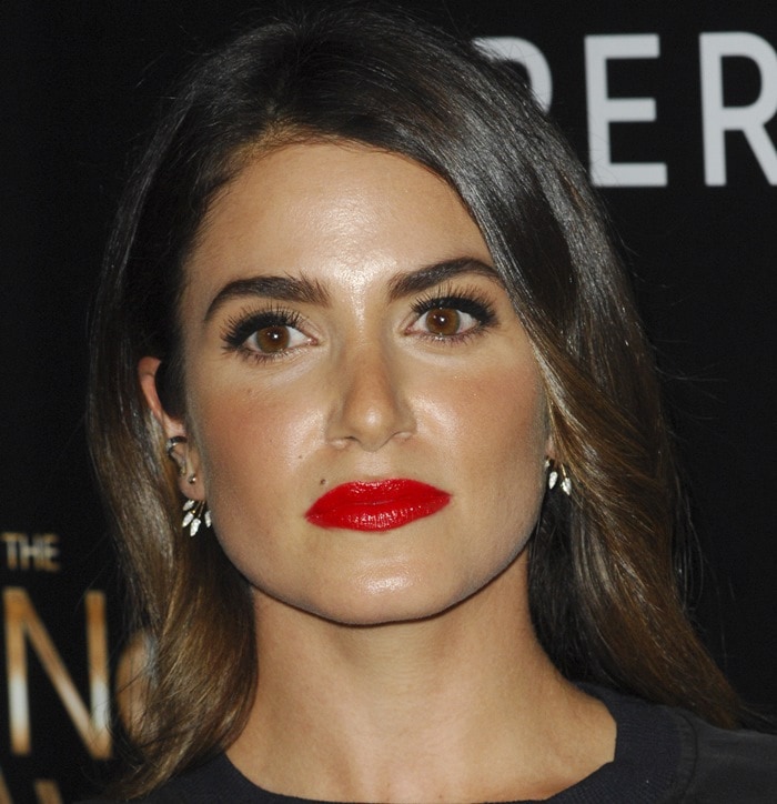 Nikki Reed wears her dark hair down at the 2015 Noble Awards