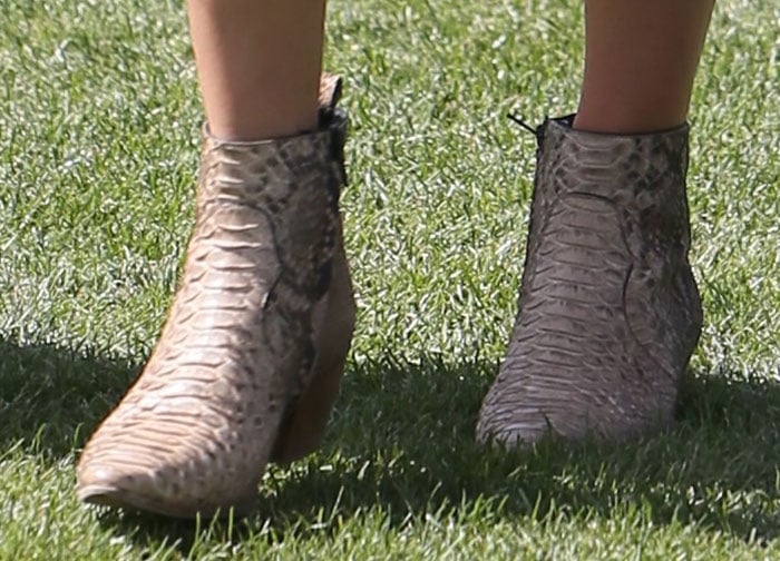 Kendall Jenner's dance boots feature tapered toes and pull tabs at the back