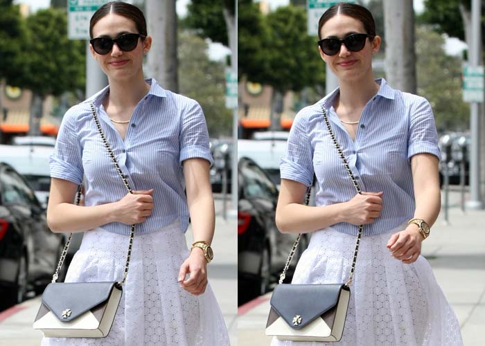 Emmy Rossum with rolled up sleeves