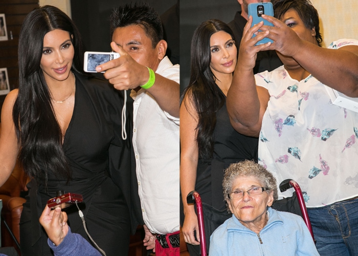 Kim Kardashian West spent time allowing a few fans to take a photo with her before the event began