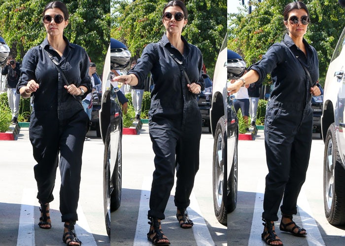 Kourtney Kardashian showed off her post-baby body in dark blue overalls