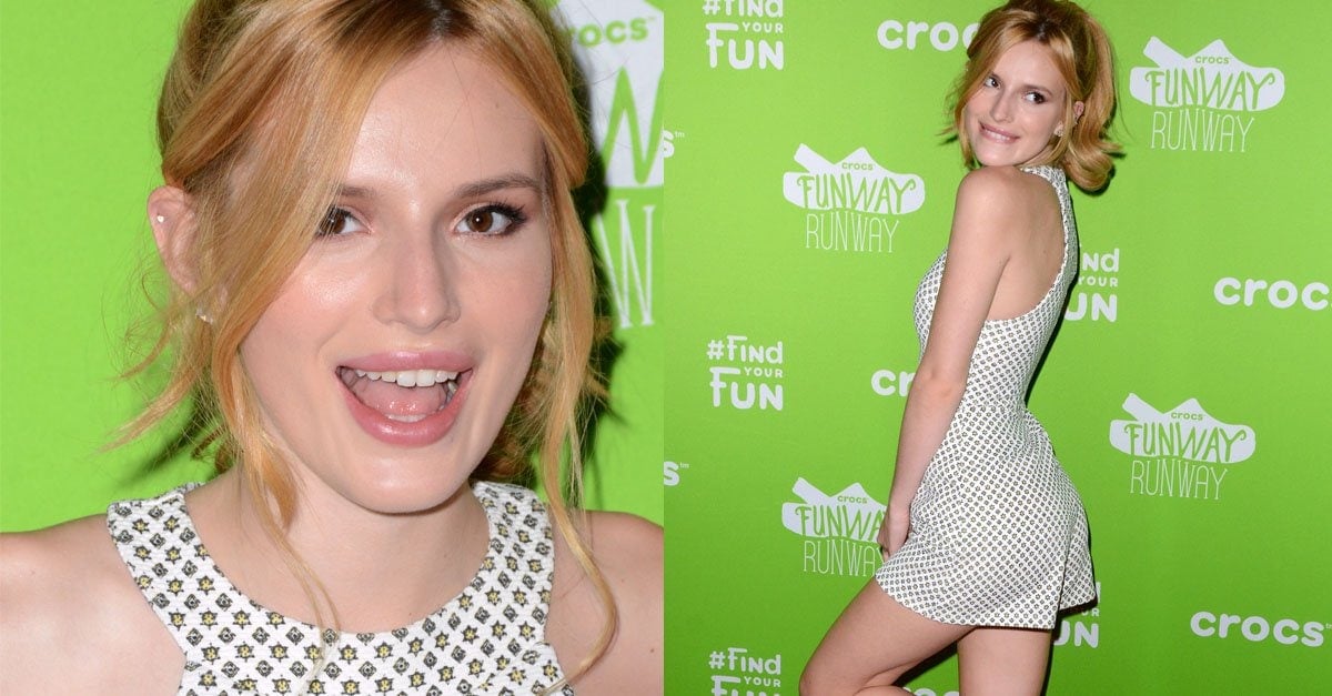 Bella Thorne's Open-Mouthed Cheerleader Smile and Loose Ponytail