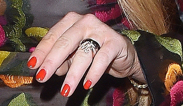 Lindsay Lohan wears a ring with the letter M on it
