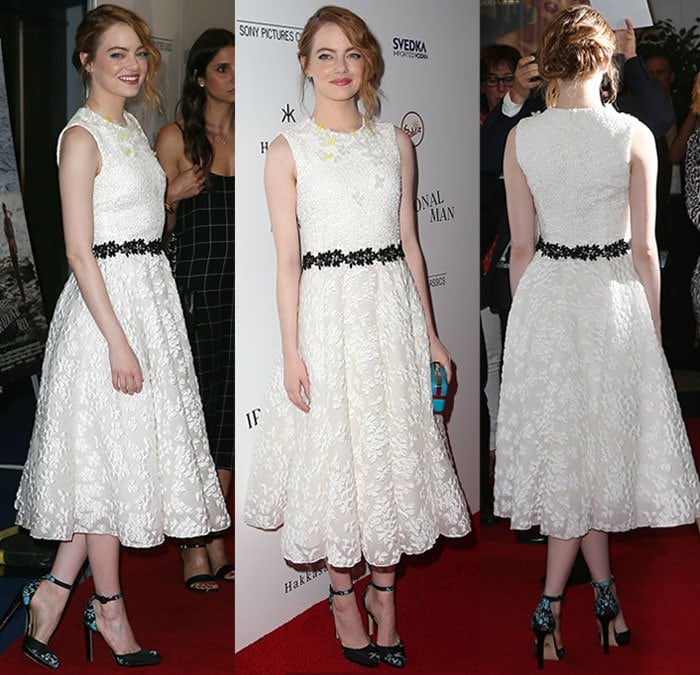 Emma Stone's dress was styled with a black floral band around her waist