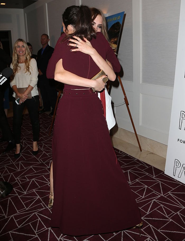 Kendall Jenner hugging Cara Delevingne at the special screening of "Paper Towns"