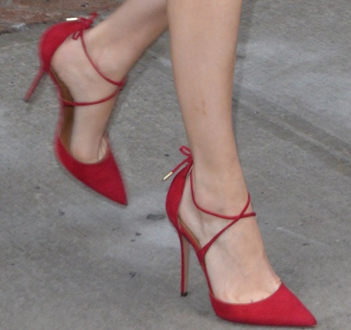 Poppy Delevingne's hot feet in red Aquazzura Matilde heels