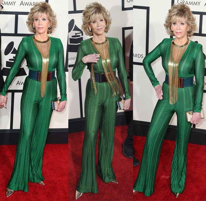 Jane Fonda stuns in a green striped Balmain jumpsuit paired with Jimmy Choo pumps and a bold gold fringed necklace at the 57th Annual GRAMMY Awards