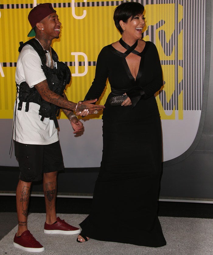 Kris Jenner and Tyga share a laugh on the carpet of the VMAs