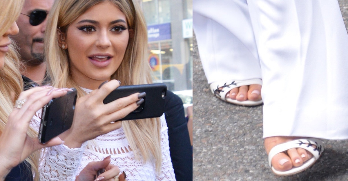 Kylie Jenner Plays Paparazzi With Sister Khloé in Gianvito Rossi ...