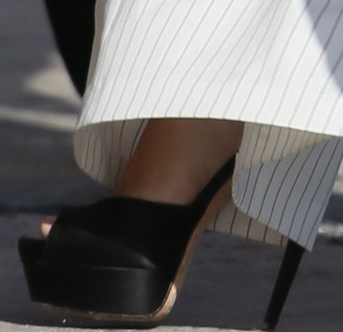 Lea Michelle completes her monochrome outfit with a pair of shoes from Brian Atwood on her feet
